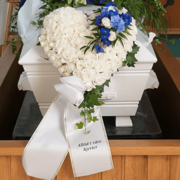 Hva skriver man på sløyfebånd begravelse?